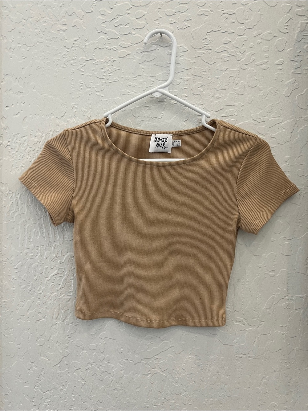 Princess Polly cropped knit short sleeve t shirt.  Size 2.  Gently used.